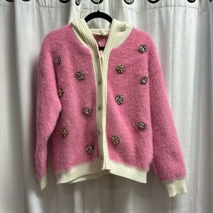 Hooded sweater with brooch detail made in Italy